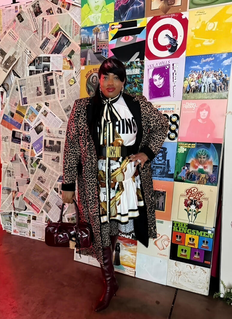 Bold prints, layered textures, and unapologetic style Statement outfit with leopard coat, layered prints, and boots